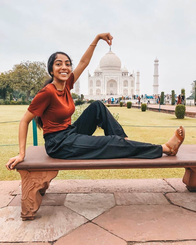 A photo of me posing at the Taj Mahal.