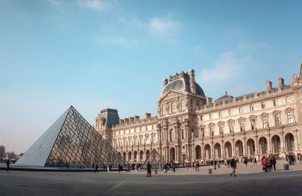 Do home travel and visit the Louvre in Paris.