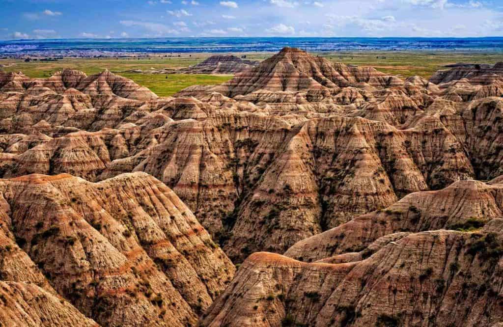 The list of underrated destinations in the USA include Badlands National Park.