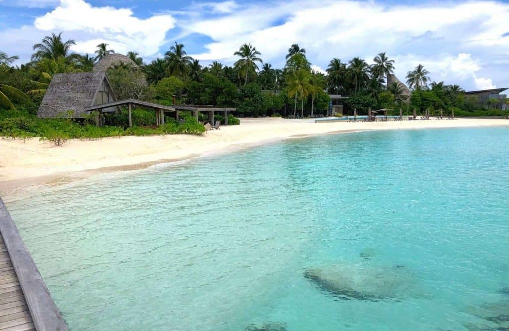 Clear blue water and overwater bungalows at the St. Regis in the Maldives.