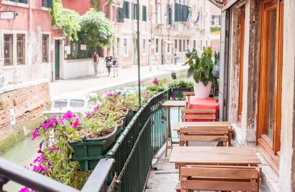 A cafe along the canal and one of the many things to know before visiting Venice is to stop at one for a pick me up during the day.