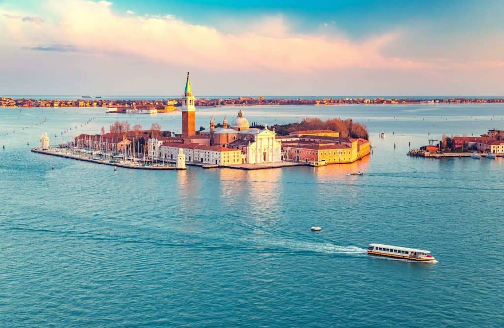 An aerial view of Venice and staying outside of town is one of the best things to know when visiting Venice to save money.