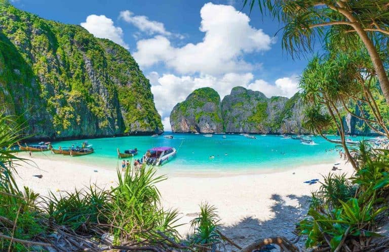 Gorgeous blue beach with limestone formations which is one of the best places to visit in Thailand for first timers.