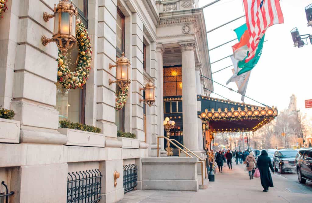 Outside of The Plaza Hotel with Christmas wreaths.