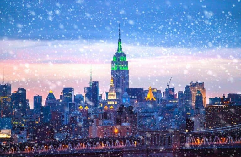 Snowy skyline of the city for a NYC Christmas bucket list.