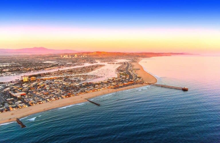 Aerial view of Newport Beach with golden sand and blue waters, which is one of the best day trips from Los Angeles.