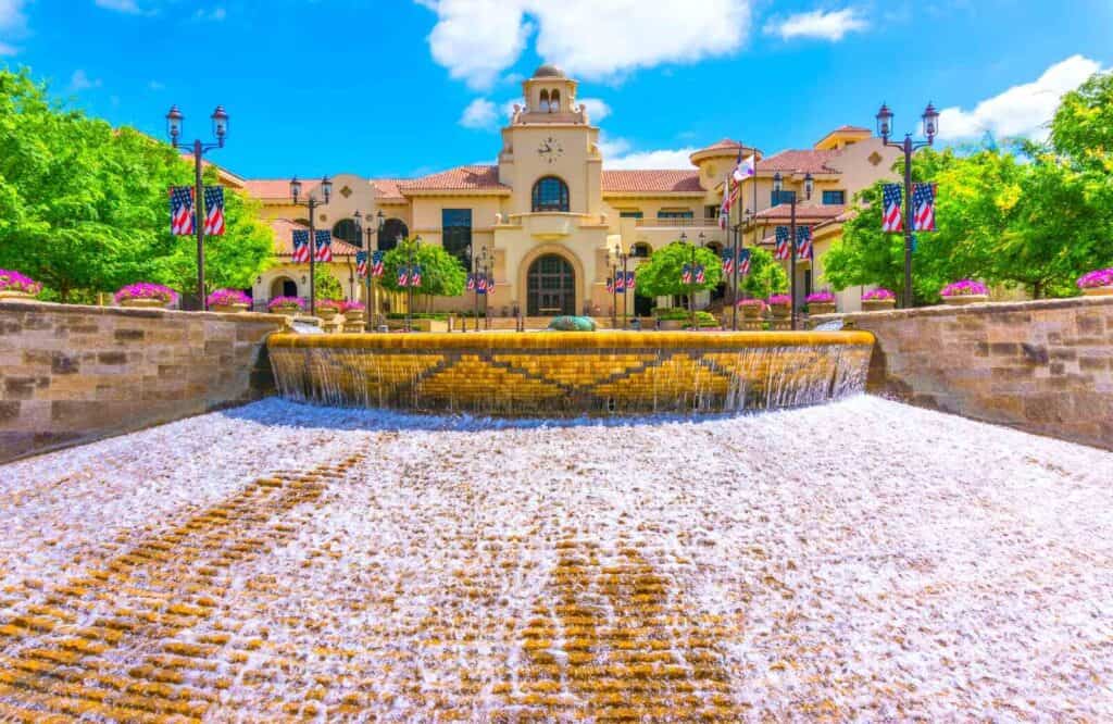 A fountain in front of the City of Temecula Civic Center, which is a Spanish Colonial style building.