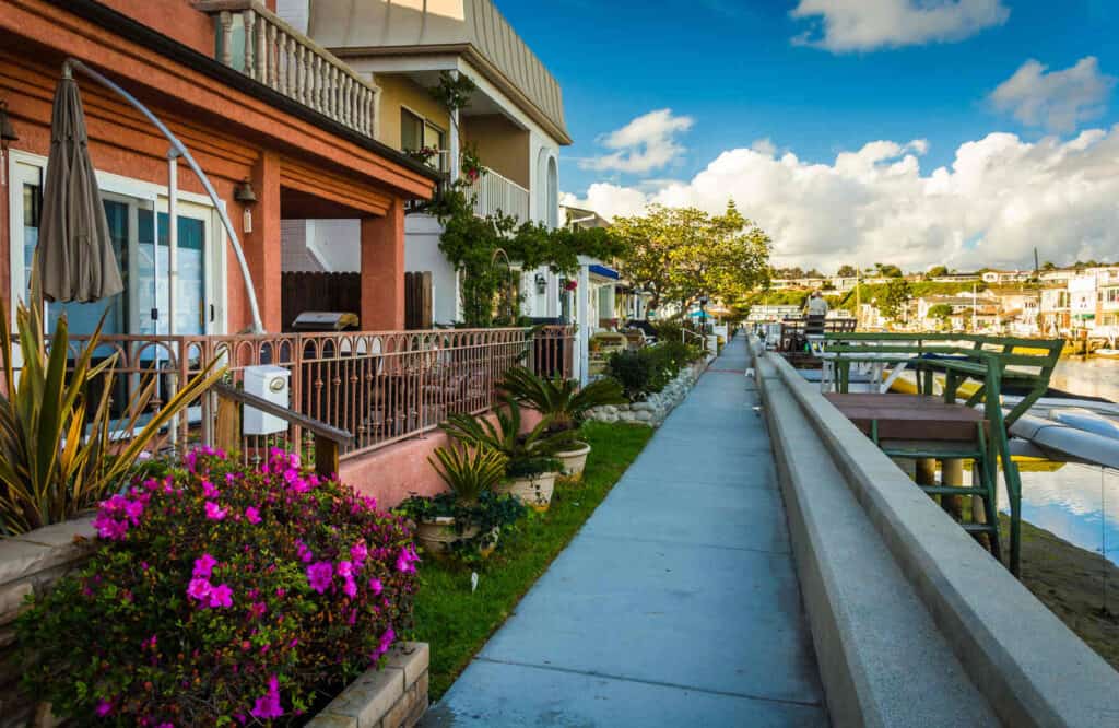 Grand Canal on Balboa Island with restaurants along the canal.