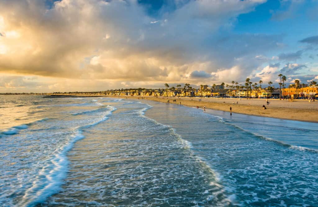 Waves crashing along the shore on a beach in Newport Beach.
