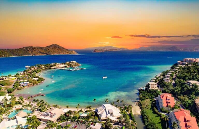 Aerial view of the ocean at sunset showing the best things to do in St. Thomas.