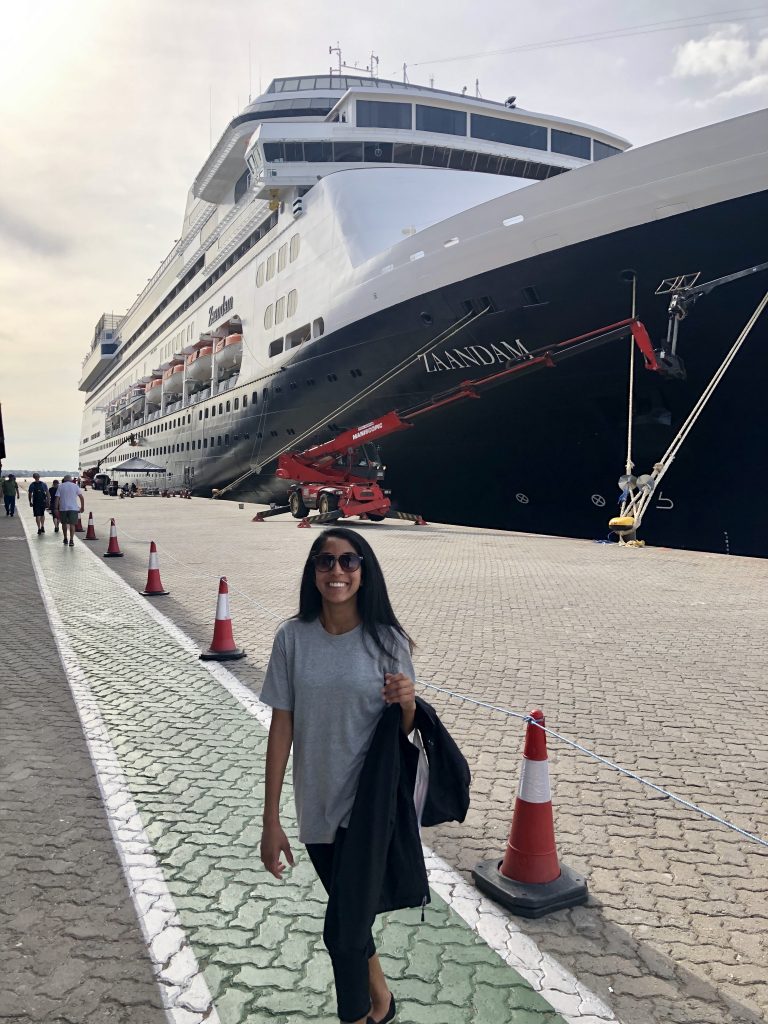 Me standing in front of one of Holland America' ships in Uruguay
