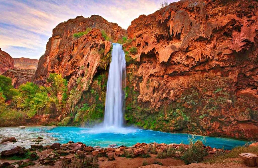 One of many bucket list places to visit in the US include Havasu Falls.