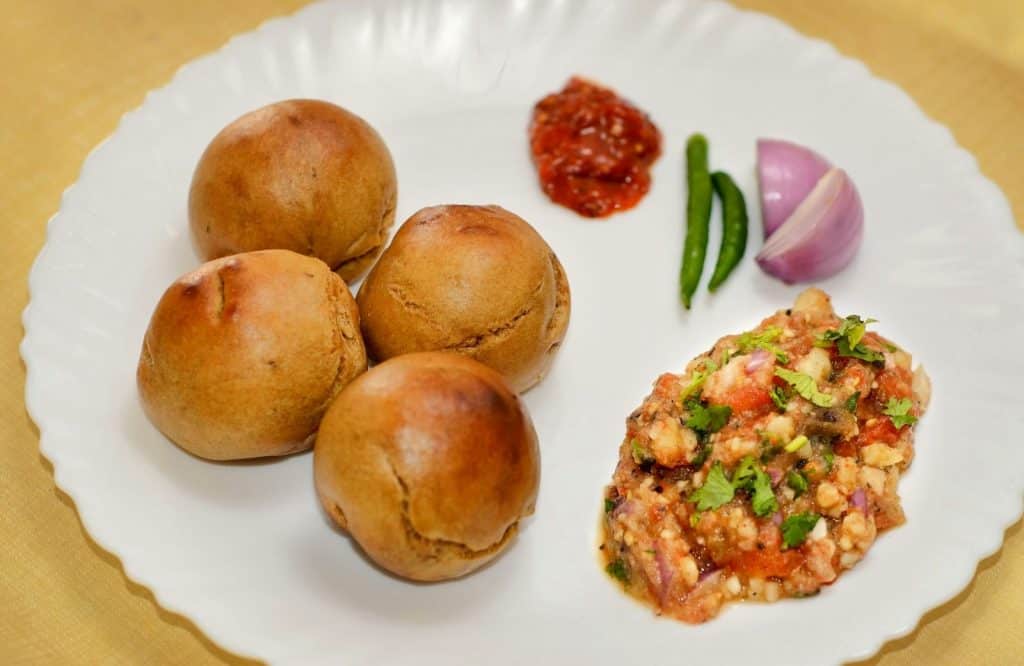 Be sure to try Litti Chokha which is a yummy Indian street food dish.